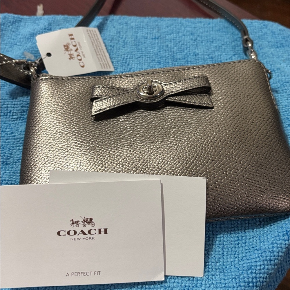 Coach Silver wristlet with bow turnlock nwt - Picture 8 of 8